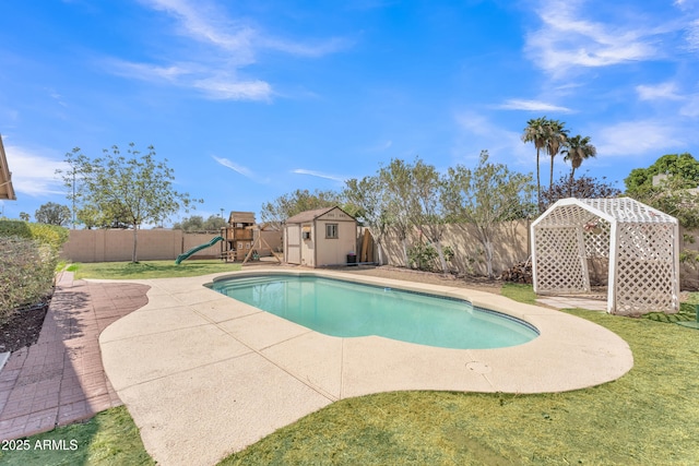 3046 E Dover St, Mesa, AZ 85213 - view of swimming pool featuring a storage shed, a fenced backyard, a playground, and a patio area