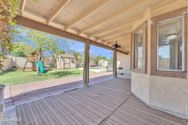 3046 E Dover St, Mesa, AZ 85213 - wooden terrace with a shed, a fenced backyard, a patio area, and a playground