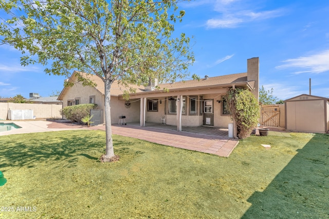 3046 E Dover St, Mesa, AZ 85213 - back of property with stucco siding, a patio, a deck, a chimney, and a gate