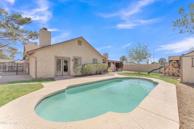 3046 E Dover St, Mesa, AZ 85213 - view of pool featuring a fenced backyard, a playground, french doors, and a patio
