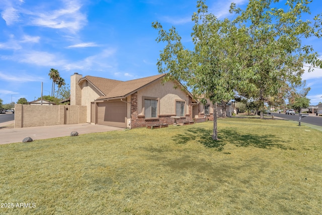 3046 E Dover St, Mesa, AZ 85213 - view of front of home featuring concrete driveway, stucco siding, brick siding, a chimney, and an attached garage