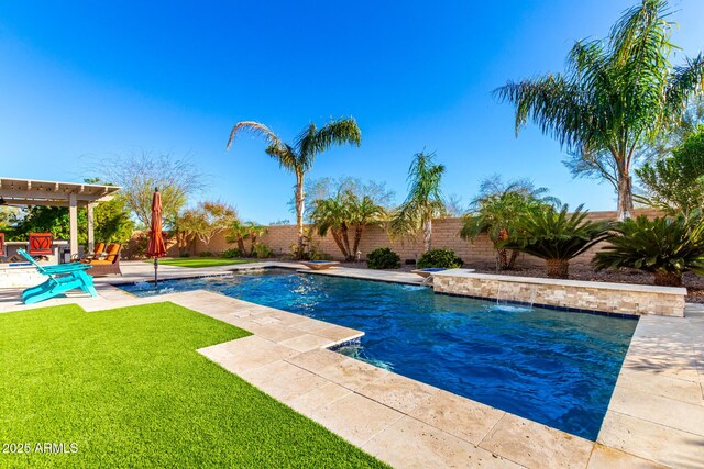 view of swimming pool with a patio area, a lawn, a fenced backyard, and a fenced in pool