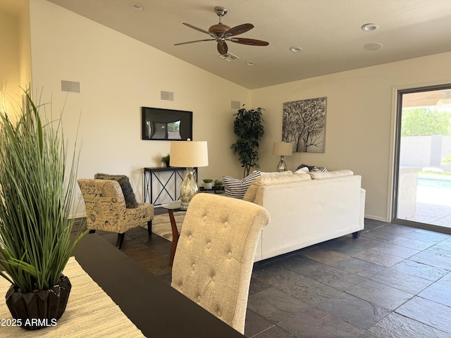 10341 E Dragoon Ave, Mesa, AZ 85208 - living room featuring stone tile flooring, lofted ceiling, a ceiling fan, and recessed lighting