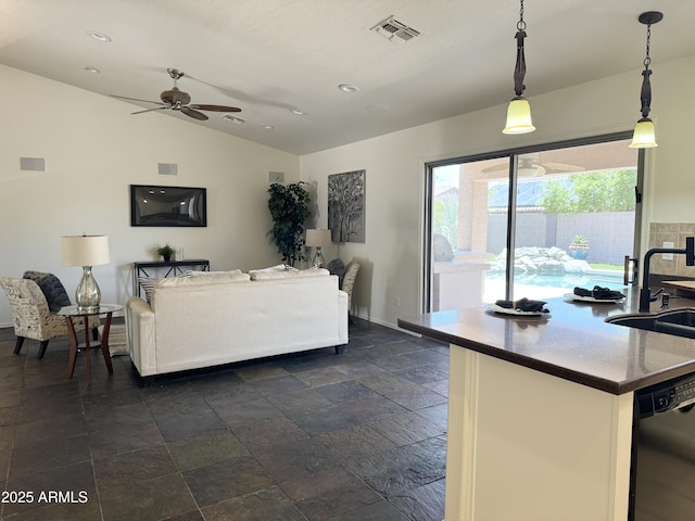 10341 E Dragoon Ave, Mesa, AZ 85208 - living room featuring ceiling fan, stone tile floors, vaulted ceiling, and recessed lighting