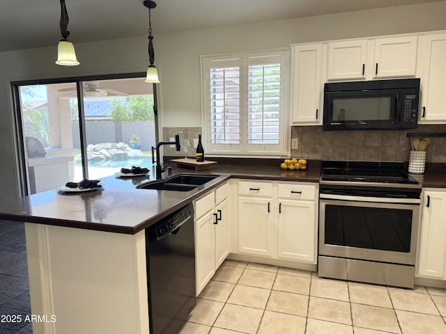 10341 E Dragoon Ave, Mesa, AZ 85208 - kitchen with black appliances, dark countertops, white cabinets, and decorative backsplash