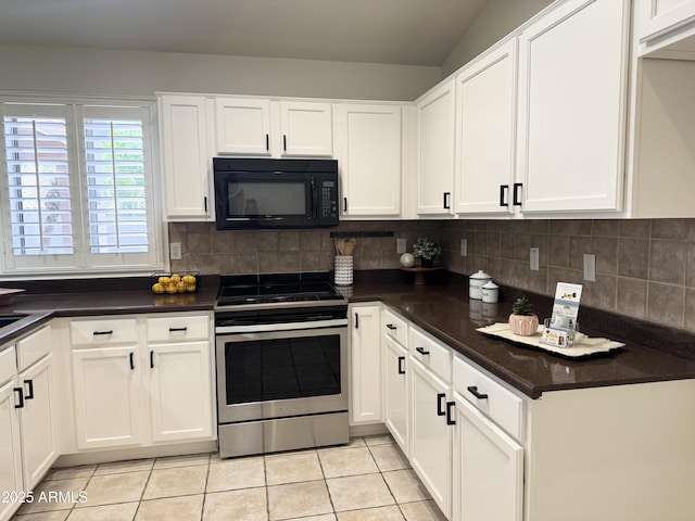 10341 E Dragoon Ave, Mesa, AZ 85208 - kitchen featuring stainless steel range with electric stovetop, black microwave, light tile patterned floors, white cabinetry, and tasteful backsplash