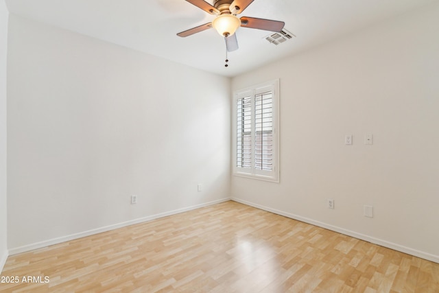 10341 E Dragoon Ave, Mesa, AZ 85208 - spare room featuring wood finished floors and a ceiling fan