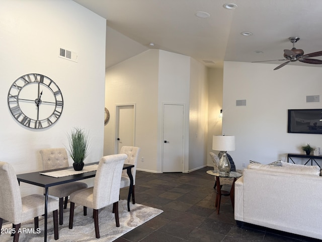 10341 E Dragoon Ave, Mesa, AZ 85208 - dining area with ceiling fan, recessed lighting, high vaulted ceiling, and dark stone finish floors