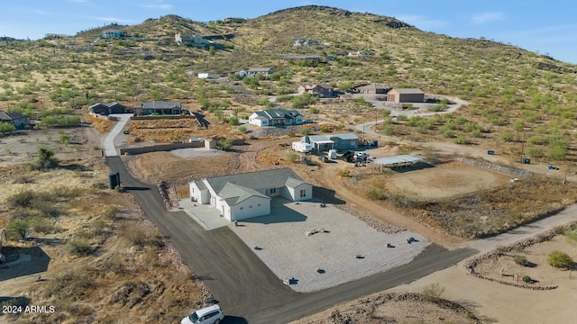 drone / aerial view featuring a mountain view