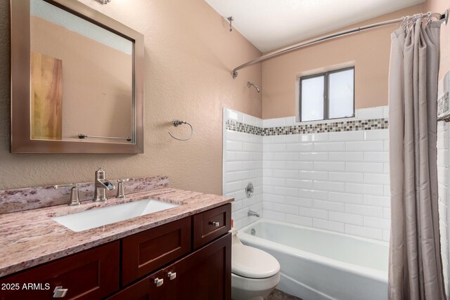 12811 N 44th Dr, Glendale, AZ 85304 - bathroom with shower / tub combo, toilet, vanity, and a textured wall