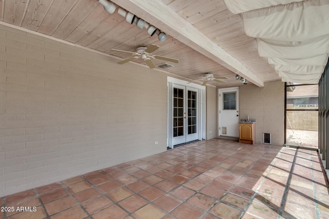 12811 N 44th Dr, Glendale, AZ 85304 - view of patio / terrace featuring a ceiling fan and french doors