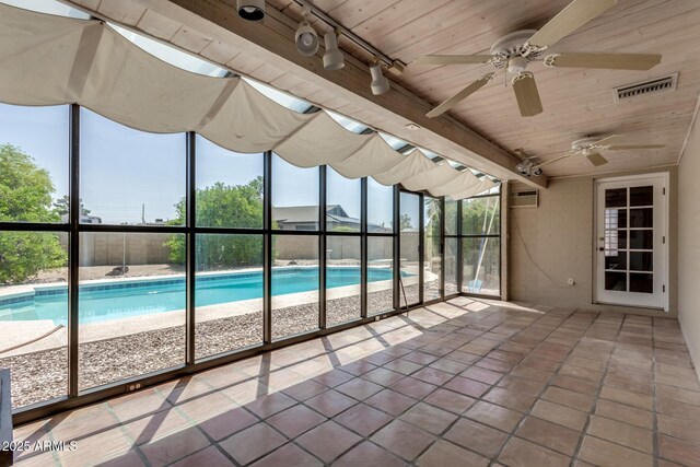 12811 N 44th Dr, Glendale, AZ 85304 - swimming pool with a patio area, a ceiling fan, and an AC wall unit