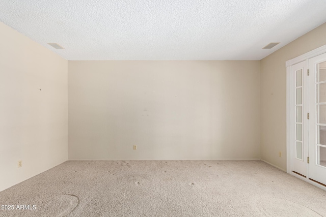 12811 N 44th Dr, Glendale, AZ 85304 - carpeted empty room with a textured ceiling