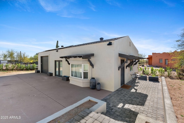 31032 N 66th St, Cave Creek, AZ 85331 - back of property featuring a patio and stucco siding