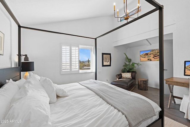 31032 N 66th St, Cave Creek, AZ 85331 - bedroom featuring wood finished floors, a chandelier, lofted ceiling, and baseboards