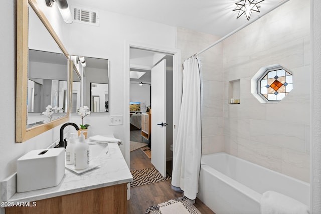 31032 N 66th St, Cave Creek, AZ 85331 - bathroom with wood finished floors, shower / bath combo, vanity, and ensuite bath