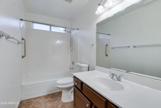 full bathroom with shower / tub combination, vanity, toilet, and tile patterned floors