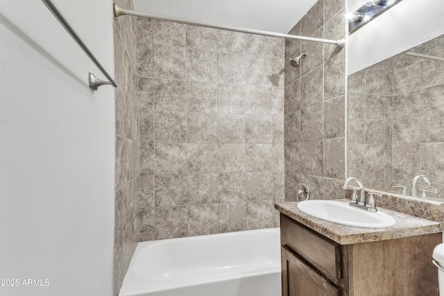 bathroom with toilet, shower / tub combination, and vanity