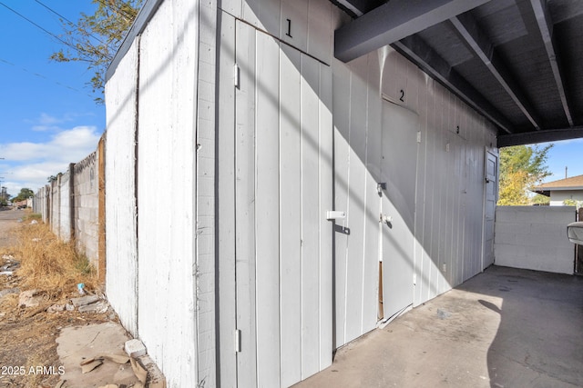 view of outdoor structure with fence