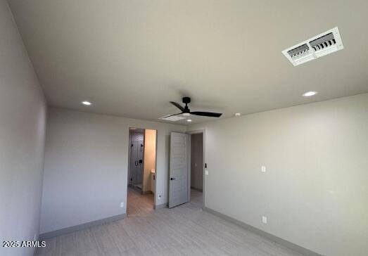 unfurnished bedroom with recessed lighting, visible vents, light wood-style flooring, and baseboards