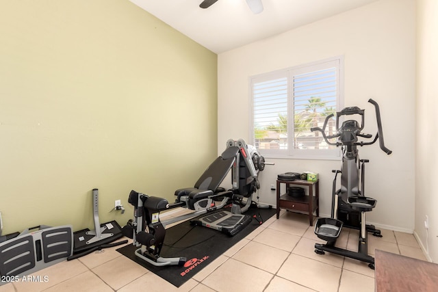 workout area with tile patterned flooring and a ceiling fan