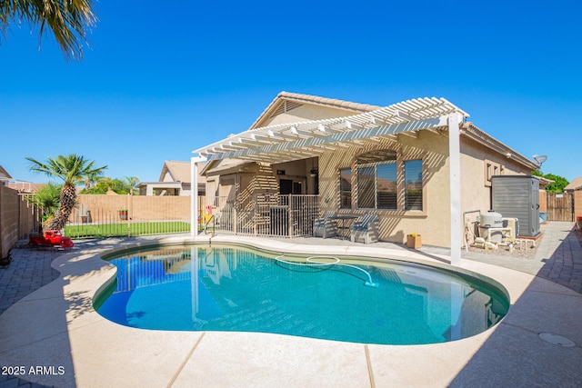 view of swimming pool with a pergola, a fenced in pool, a patio, and a fenced backyard