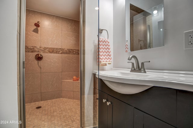 bathroom with vanity and walk in shower