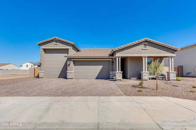 view of front of property with a garage