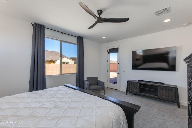 bedroom with carpet, ceiling fan, and access to exterior