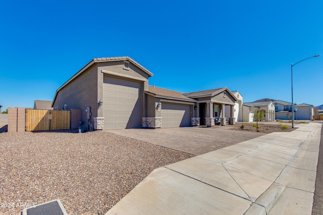 single story home featuring a garage