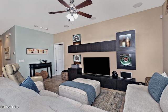 living area with a ceiling fan