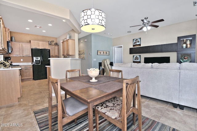 dining area with light tile patterned floors, a ceiling fan, visible vents, and recessed lighting