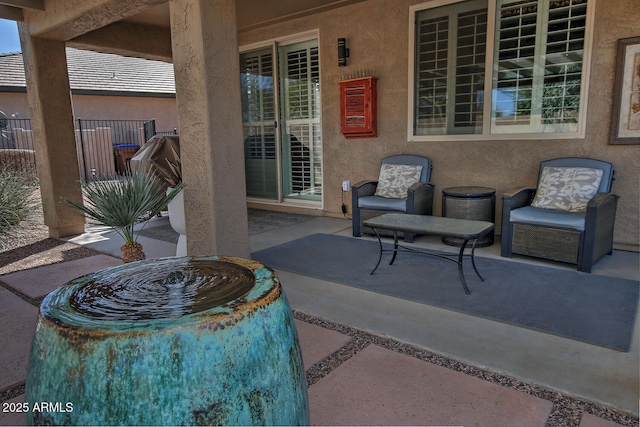 view of patio with fence