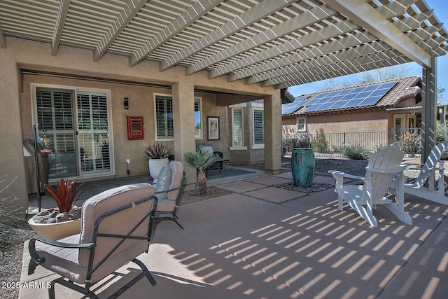 view of patio with fence and a pergola