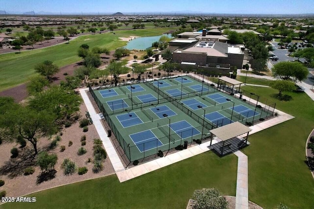 birds eye view of property with a water view