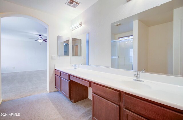 5659 S 239th Dr, Buckeye, AZ 85326 - full bathroom featuring a sink, visible vents, a ceiling fan, and double vanity