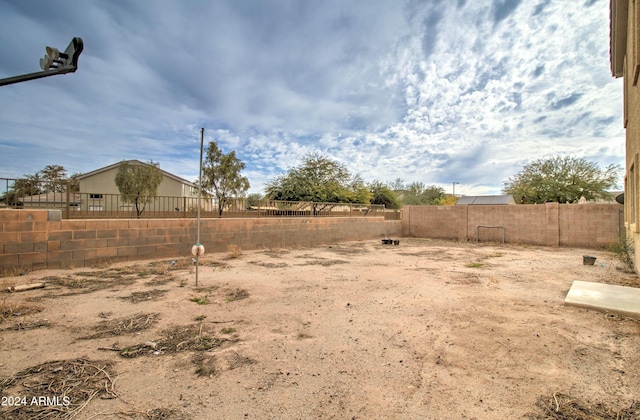 5659 S 239th Dr, Buckeye, AZ 85326 - view of yard featuring a fenced backyard