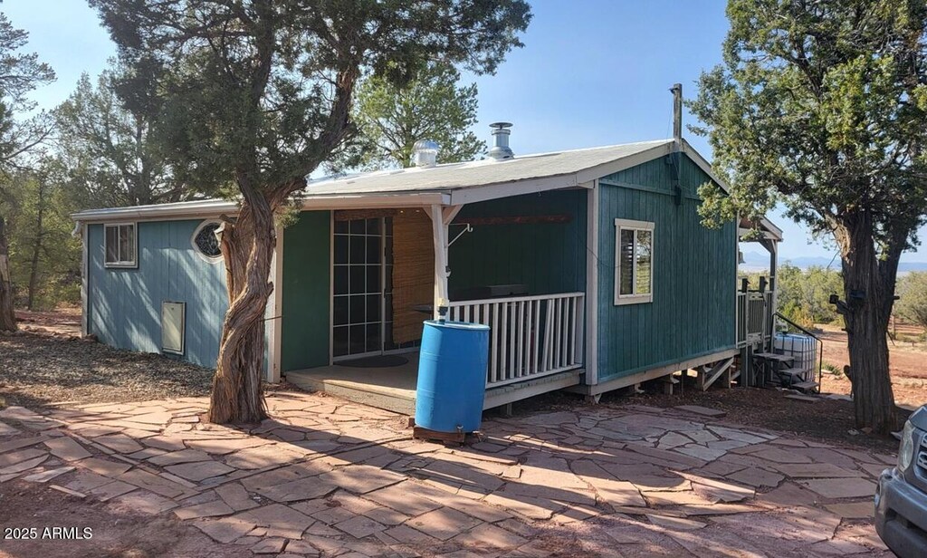 484 W Cone Ln, Ash Fork, AZ 86320 - exterior space featuring covered porch