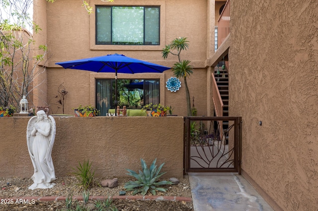 16233 E Rosetta Dr Unit 47, Fountain Hills, AZ 85268 - view of front of house with a gate and stucco siding