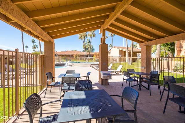 16233 E Rosetta Dr Unit 47, Fountain Hills, AZ 85268 - view of patio / terrace featuring a community pool and outdoor dining space
