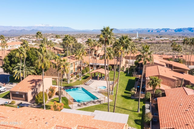 16233 E Rosetta Dr Unit 47, Fountain Hills, AZ 85268 - aerial perspective of suburban area with a pool and a mountainous background