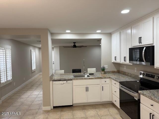 kitchen with a ceiling fan, a sink, electric range, dishwasher, and recessed lighting