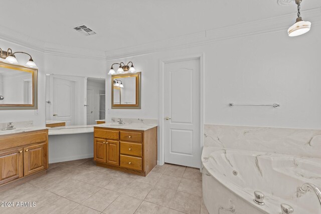 bathroom with tile patterned flooring, a washtub, vanity, and crown molding