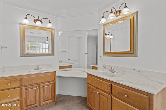 bathroom featuring tile patterned floors, vanity, and crown molding