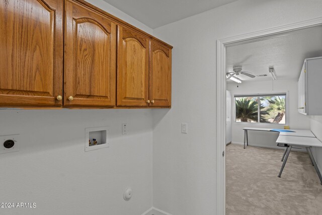 washroom featuring cabinets, hookup for an electric dryer, light carpet, ceiling fan, and hookup for a washing machine