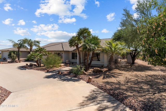 ranch-style home with a garage