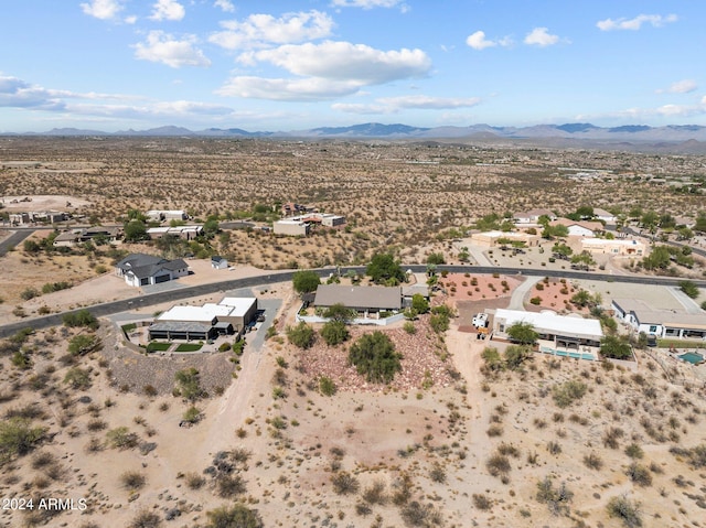 drone / aerial view featuring a mountain view