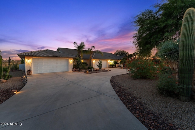 view of front of house with a garage