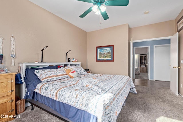 carpeted bedroom featuring ceiling fan