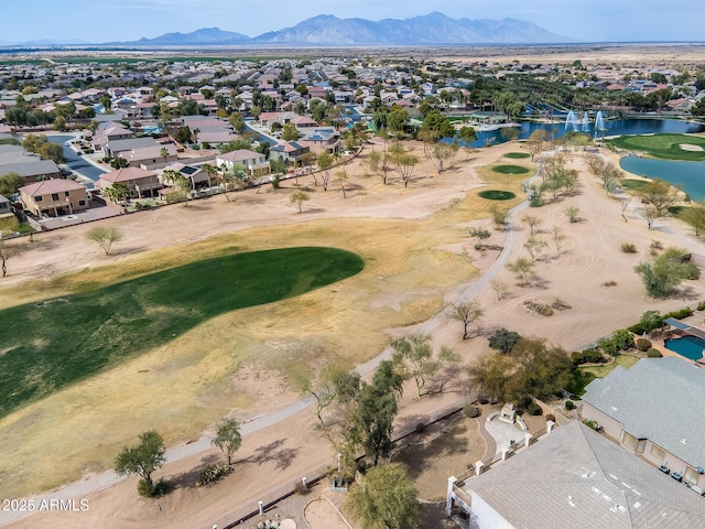 birds eye view of property featuring a water and mountain view